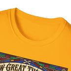 How Great Thou Bark Golden Retriever T-shirt close-up detail shot on a gold shirt, showing the colorful stained-glass style graphic with crossbones and 'How Great Thou Bark' lettering at the neckline.