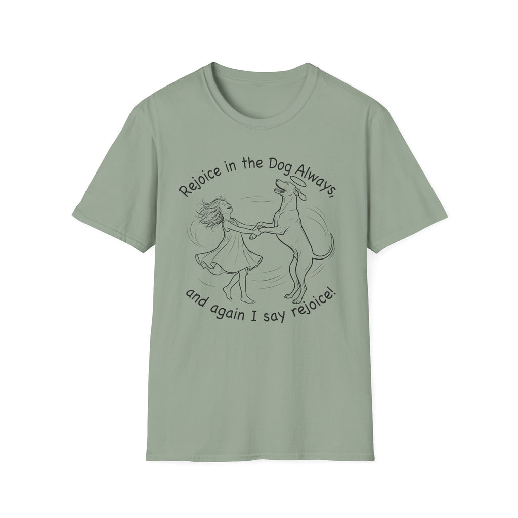 Rejoice in the Dog Rhodesian Ridgeback T-Shirt in sage green, flat lay mockup showing a woman joyfully dancing with a rearing Rhodesian Ridgeback line-art illustration and the text 'Rejoice in the Dog Always, and again I say rejoice!'