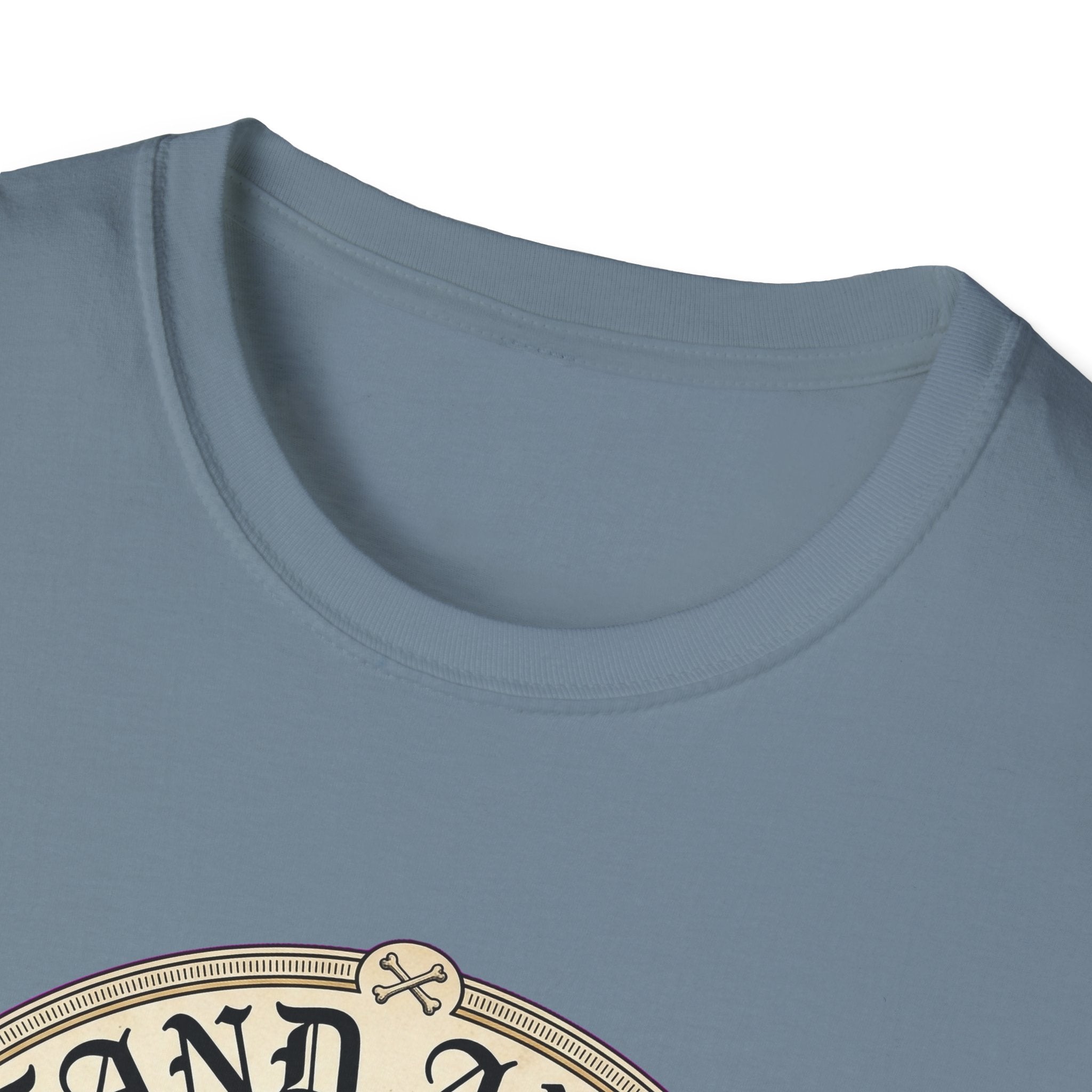 I Stand Amazed Belgian Malinois T-Shirt in steel blue, close-up of the neckline and upper graphic detail showing the circular Belgian Malinois design with crossed-bone medallion and vintage lettering.