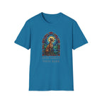 How Great Thou Bark Sight Hound T-shirt flat lay, sapphire blue shirt featuring a stained-glass style arched window graphic of a seated sight hound dog with a halo and the text 'How Great Thou Bark.'