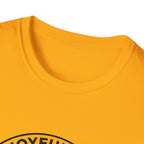 The Joyful Sound of Barking T-shirt close-up detail shot on a gold shirt, showing the circular badge graphic with the 'Joyful Sound' lettering at the neckline.