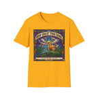 How Great Thou Bark Golden Retriever T-shirt flat lay, gold shirt featuring a stained-glass style graphic of a golden retriever on a hilltop with sunbeams and the text 'How Great Thou Bark – A Hymn for the Devoted.'