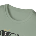 Dogma House Logo Light T-Shirt close-up of the neckline on a sage green shirt, showing the border collie face with golden halo from the Dogma House logo.