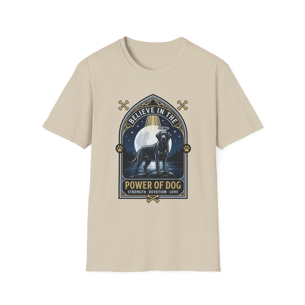 Believe in the Power of Dog Black Lab T-Shirt in sand natural, flat lay view showing a gothic arch-framed graphic of a halo-wearing black Labrador standing under a full moon with a starry night sky, paw prints, crossed bones, and the words 'Strength Devotion Love'.