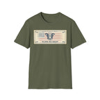 In Dog We Trust Bill T-Shirt flat lay in military green, featuring a currency-style graphic of a dog portrait with a halo set against a vintage American flag, printed with the text 'In Dog We Trust.'