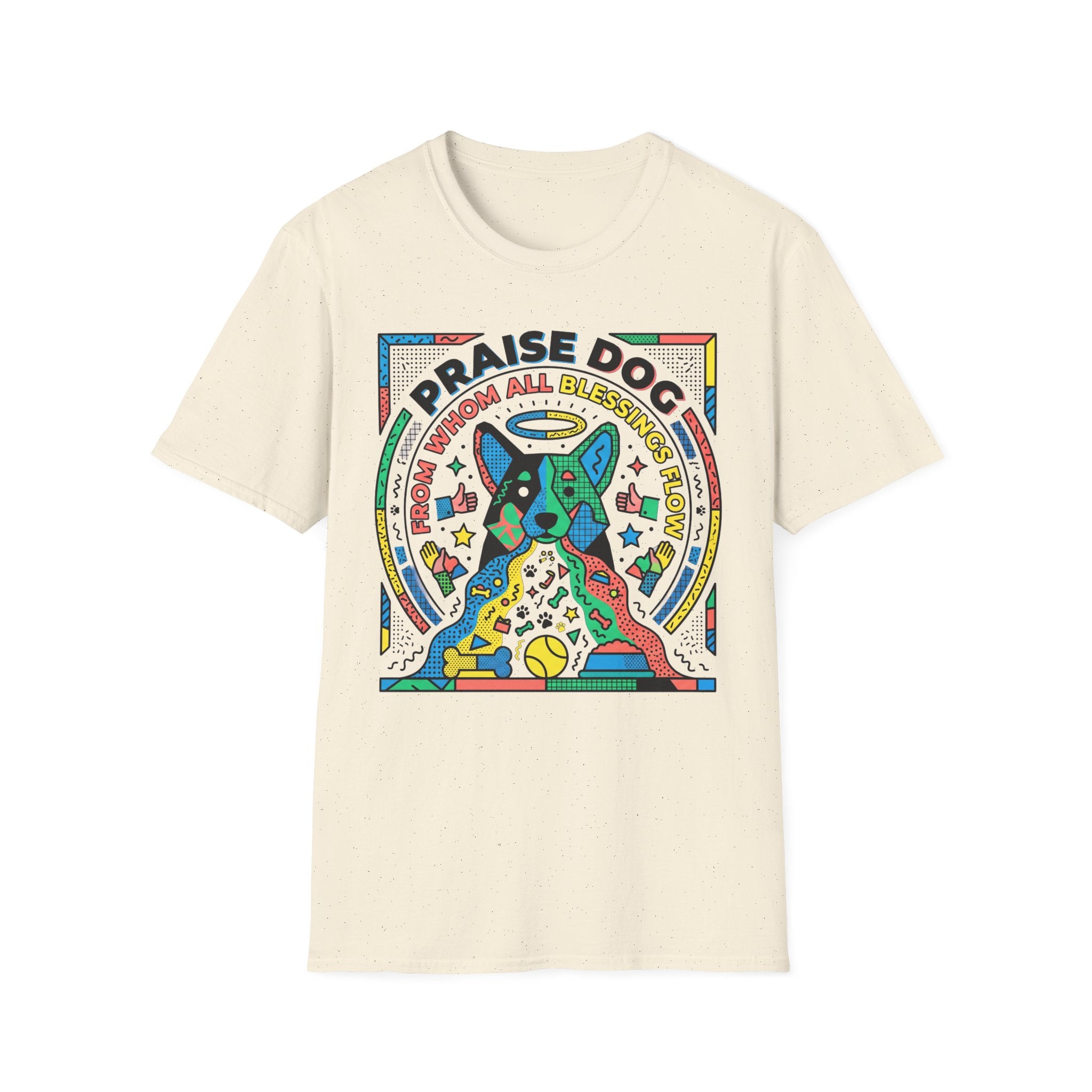 Praise Dog From Whom All Blessings Flow Geometric T-Shirt flat lay in natural tan, featuring a bold pop-art style graphic of a colorful geometric dog with a halo, surrounded by stars, thumbs up, and dog toy icons in vivid primary colors.