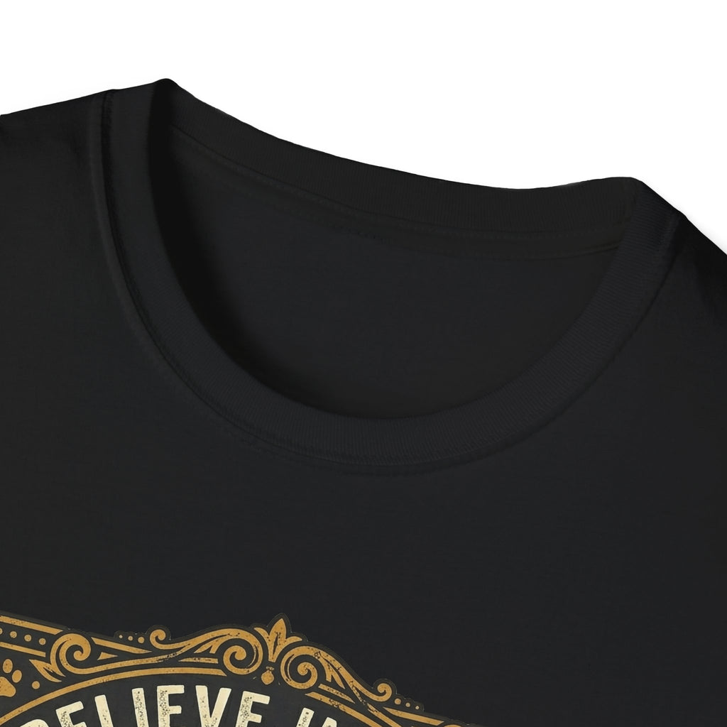 Believe in the Power of Dog T-shirt close-up detail on black shirt showing the ornate gold border and 'Believe In The' text of the vintage badge graphic.