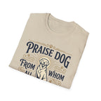 Praise Dog From Whom All Blessings Flow Golden Retriever T-Shirt folded view in natural tan, showing the vintage-style halo golden retriever graphic and Praise Dog lettering.