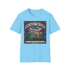 How Great Thou Bark Golden Retriever T-shirt flat lay, light blue shirt featuring a stained-glass style graphic of a golden retriever on a hilltop with sunbeams and the text 'How Great Thou Bark – A Hymn for the Devoted.'
