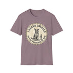 I Stand Amazed Rescue Mutt T-Shirt in dusty mauve, flat lay front view featuring a vintage-style circular graphic of a halo-wearing mixed-breed rescue dog with the text 'I Stand Amazed in the Presence of Dog.'