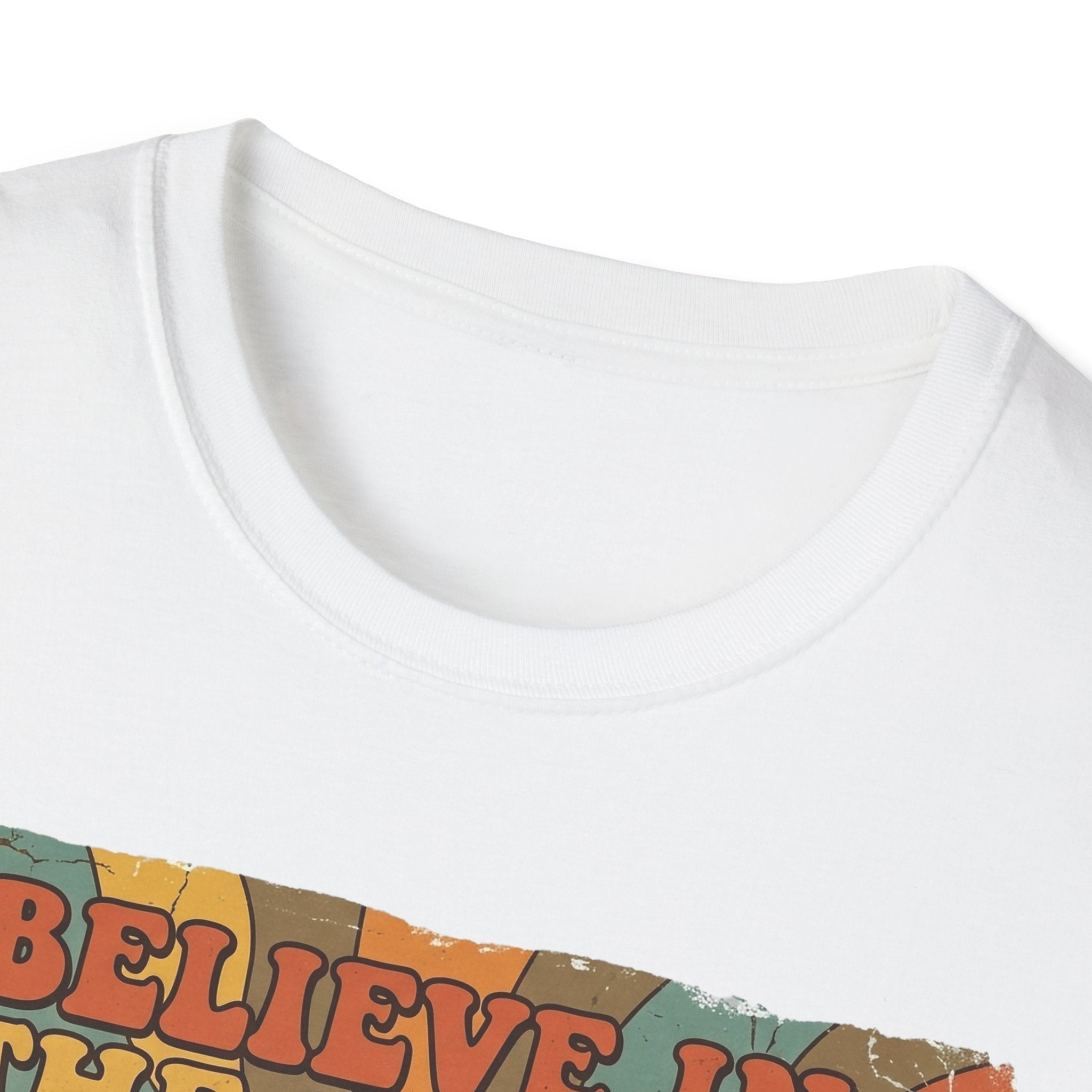 Believe in the Power of Dog Retro T-Shirt close-up detail in white, showing the collar and top edge of the retro rainbow and groovy text graphic.