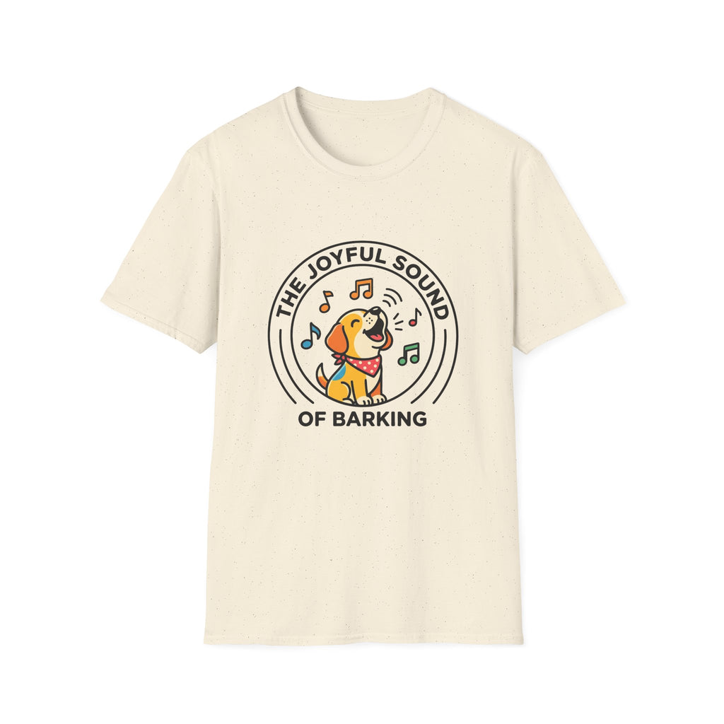 The Joyful Sound of Barking T-shirt flat lay, natural tan shirt featuring a circular badge graphic of a cartoon yellow dog with a red bandana howling joyfully with musical notes and the text 'The Joyful Sound of Barking.'