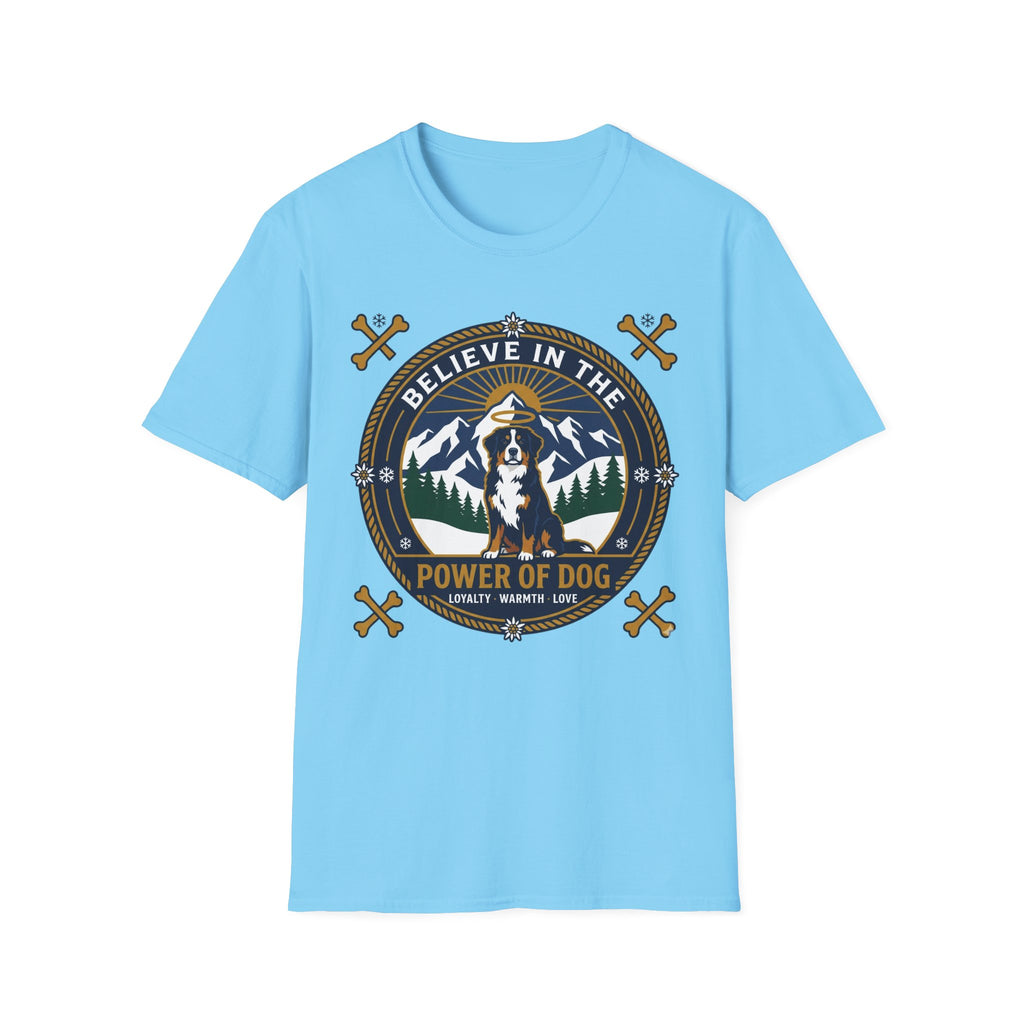 Believe in the Power of Dog Bernese T-Shirt in light blue, flat lay view showing a circular badge graphic with a halo-wearing Bernese Mountain Dog set against a mountain and forest landscape, with crossed bones and the words 'Loyalty Warmth Love'.