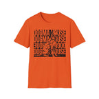 Dogma House Dalmatian T-Shirt flat lay in orange, featuring a tonal dark orange graphic of a seated Dalmatian overlaid on a repeating 'Dogma House' text block in a street-art style.