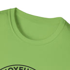 The Joyful Sound of Barking T-shirt close-up detail shot on a kiwi green shirt, showing the top of the circular badge graphic with 'The Joyful Sound' lettering at the neckline.