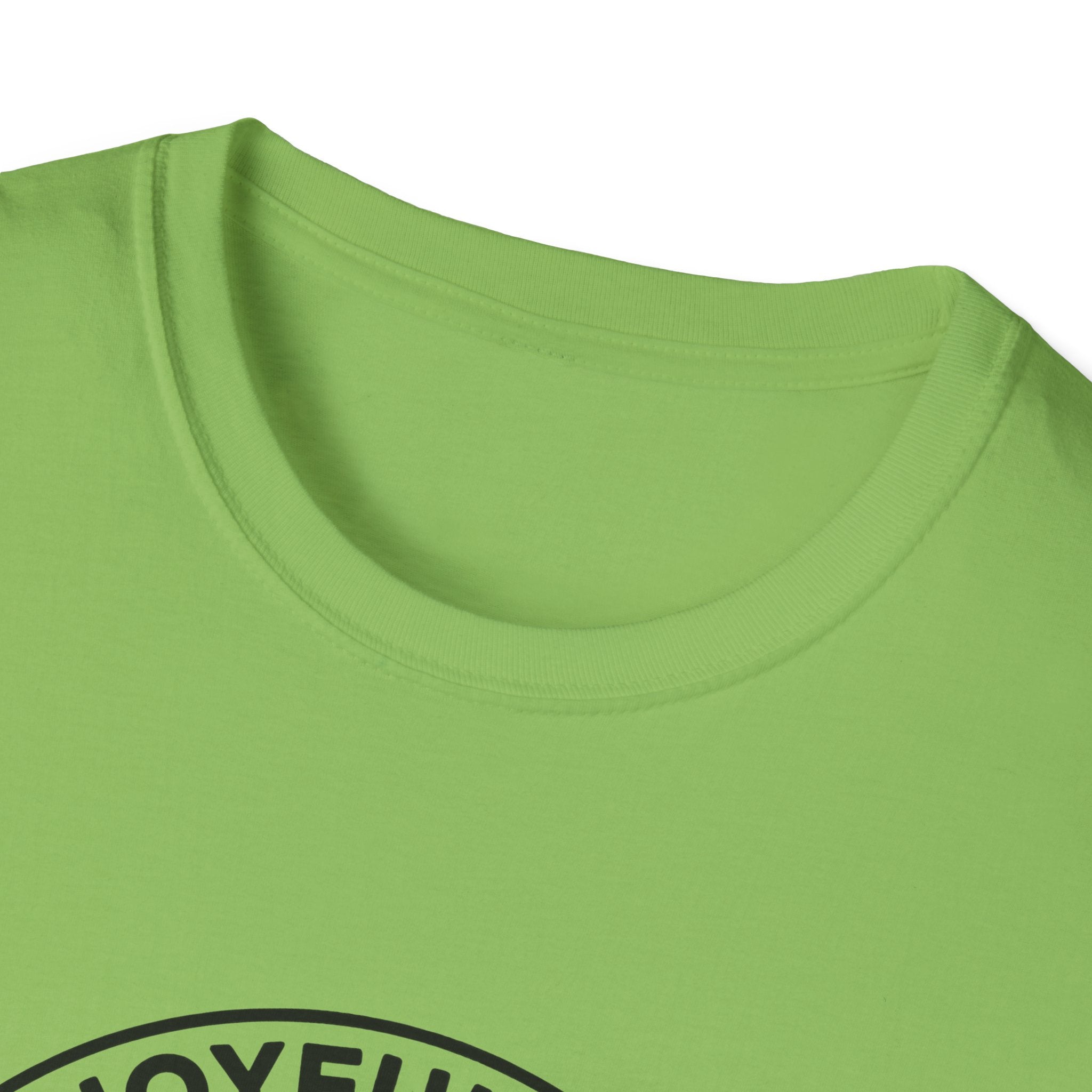 The Joyful Sound of Barking T-shirt close-up detail shot on a kiwi green shirt, showing the top of the circular badge graphic with 'The Joyful Sound' lettering at the neckline.