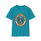 What Would Dog Do T-Shirt flat lay on teal shirt featuring an ornate vintage frame design with a halo-wearing pit bull and the text What Would Dog Do? WWDD.
