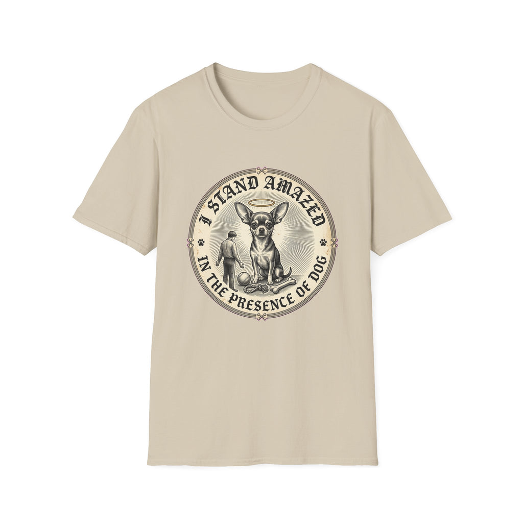 I Stand Amazed Chihuahua T-Shirt in sand, flat lay front view featuring a vintage-style circular graphic of a Chihuahua with a halo seated above a small human figure bowing in reverence, with the text 'I Stand Amazed in the Presence of Dog.'