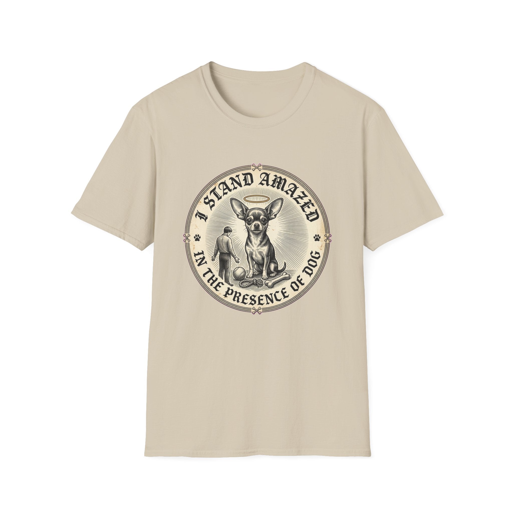 I Stand Amazed Chihuahua T-Shirt in sand, flat lay front view featuring a vintage-style circular graphic of a Chihuahua with a halo seated above a small human figure bowing in reverence, with the text 'I Stand Amazed in the Presence of Dog.'