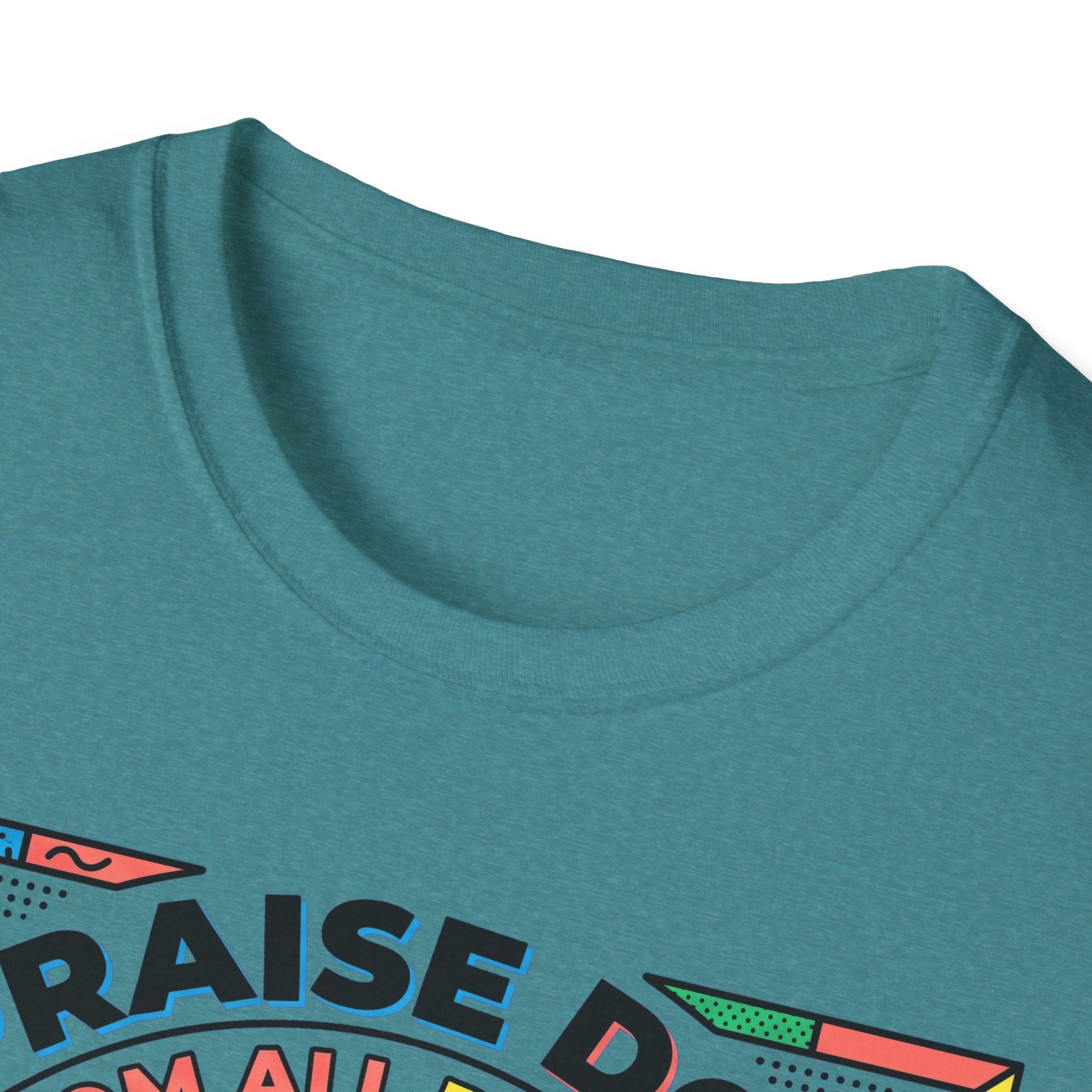 Praise Dog From Whom All Blessings Flow Geometric T-Shirt close-up detail of the collar area on a teal shirt, showing the colorful pop-art border of the Praise Dog graphic.