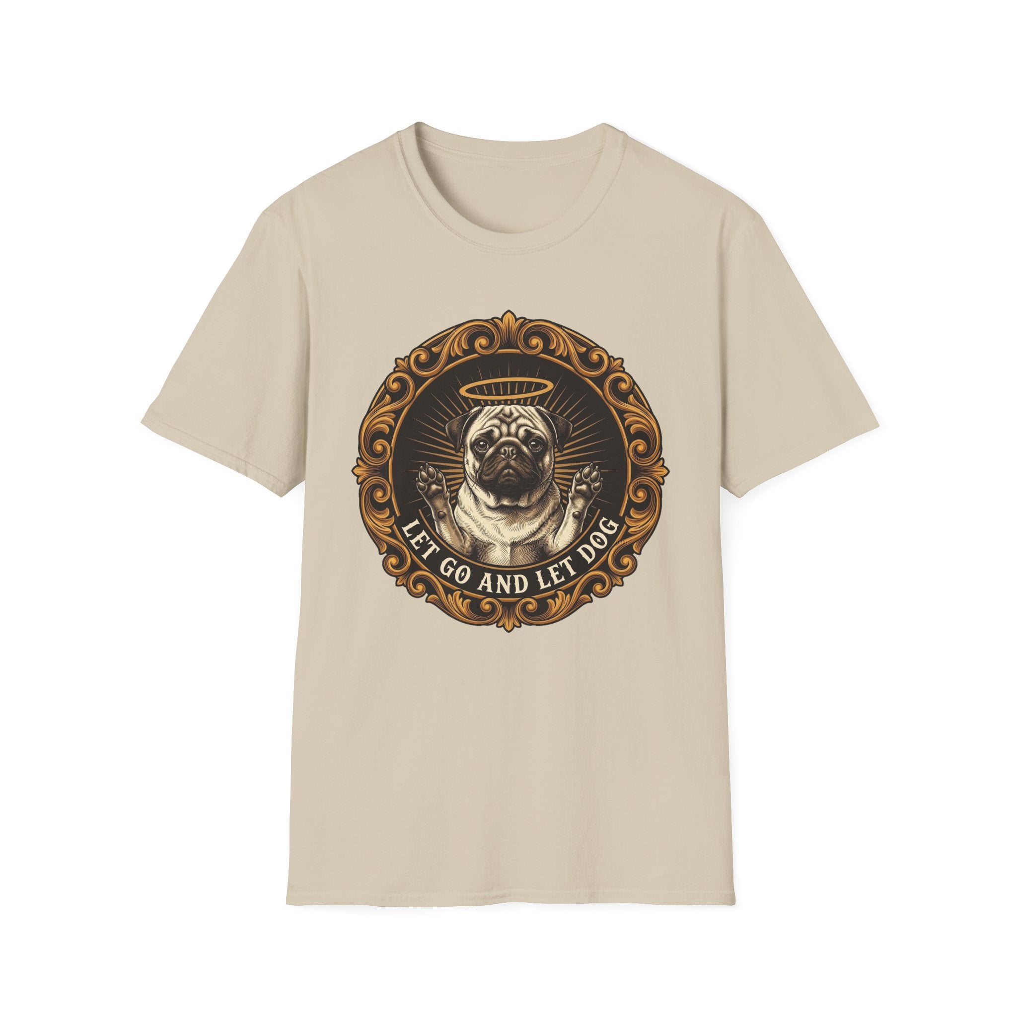 Let Go Let Dog Pug T-Shirt flat lay on sand, featuring an ornate gold-framed medallion with a halo-wearing pug raising its paws and the text 'Let Go and Let Dog'.