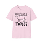 Believe in the Power of Dog T-Shirt flat lay in light pink, featuring a line-art dog silhouette and the text Believe in the Power of Dog with a paw print accent.