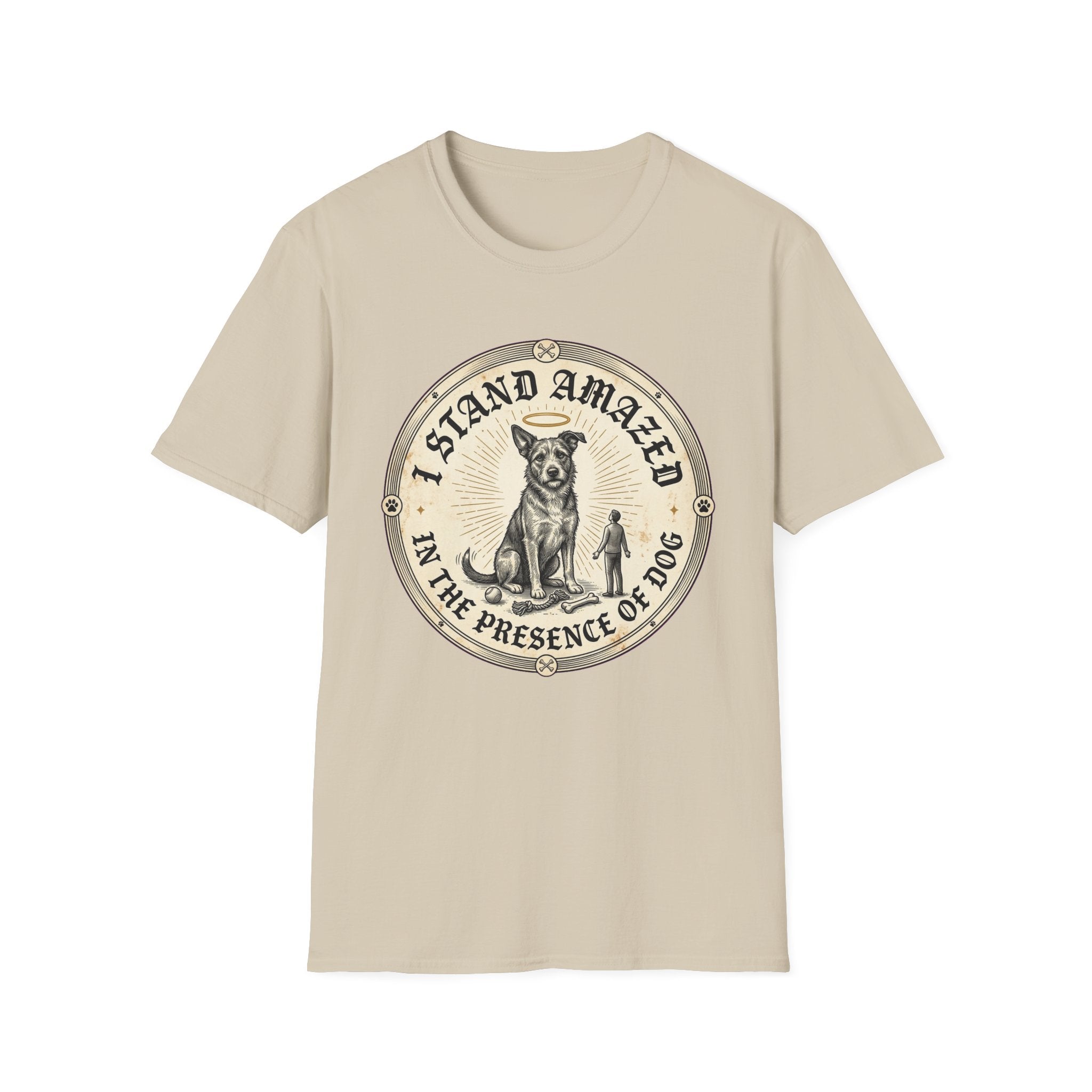 I Stand Amazed Rescue Mutt T-Shirt in sand, flat lay front view featuring a vintage-style circular graphic of a halo-wearing mixed-breed rescue dog with the text 'I Stand Amazed in the Presence of Dog.'