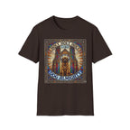 Holy Holy Holy St Bernard T-Shirt flat lay on dark chocolate brown, featuring a stained-glass-style illustration of a St Bernard seated before cathedral arches with the text 'Holy Holy Holy Lord Dog Almighty'.