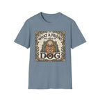 What a Friend We Have in Dog T-Shirt flat lay, slate blue shirt featuring a vintage botanical-framed graphic of a golden retriever with a halo seated before a cathedral archway with the text 'What a Friend We Have in Dog.'
