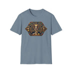 Praise Dog From Whom All Blessings Flow Corgi T-Shirt flat lay in slate blue, featuring an ornate medieval stained-glass style graphic of a regal corgi seated in a jewel-encrusted octagonal frame with gold gothic lettering and dog bone and tennis ball accents.