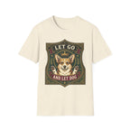 Let Go Let Dog Corgi T-Shirt in natural cream, flat lay, featuring an ornate heraldic shield badge with a crowned corgi raising both paws and the text 'Let Go / And Let Dog'.