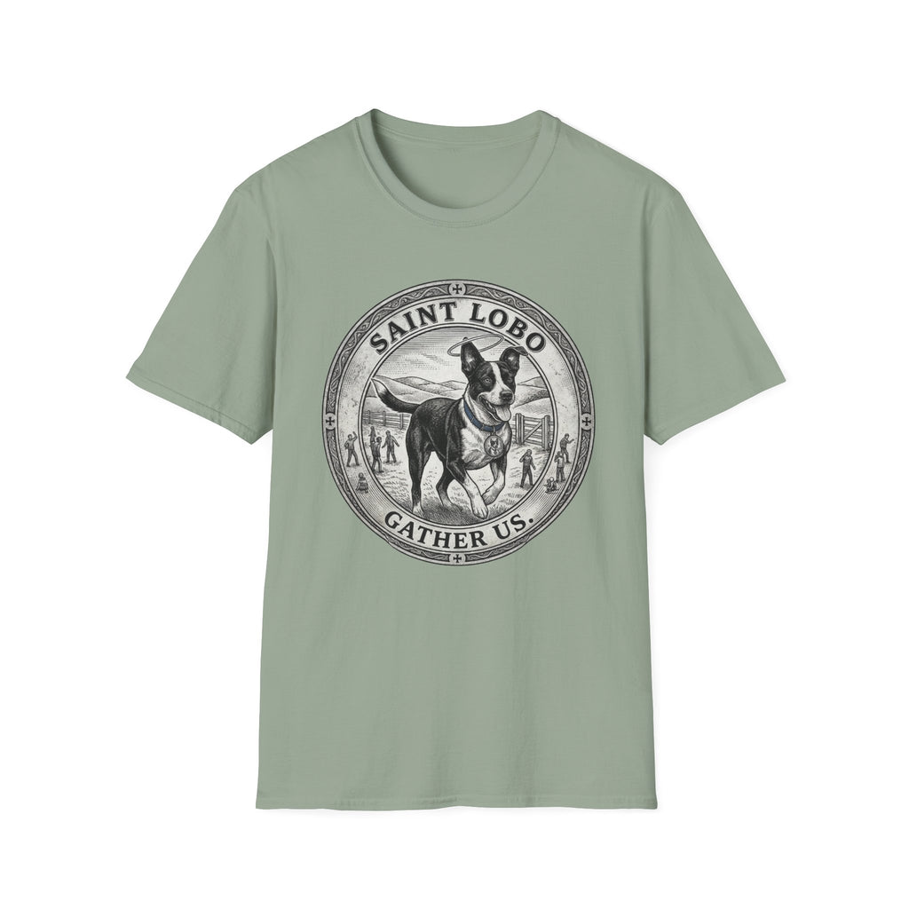 Saint Lobo Gather Us T-Shirt flat lay in sage green, featuring a vintage medallion graphic of a leaping border collie-style dog with a halo, surrounded by the text 'Saint Lobo — Gather Us.'