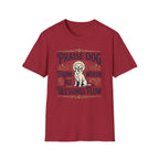 Praise Dog From Whom All Blessings Flow Golden Retriever T-Shirt flat lay in cardinal red, featuring a vintage-style graphic of a seated golden retriever with a glowing halo, surrounded by ornate scroll flourishes and paw print accents.