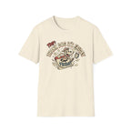 Thank Dog It's Friday T-Shirt flat lay on natural cream shirt featuring a retro cartoon dog bursting through a Friday calendar page with bold TDIF: Thank Dog It's Friday text.