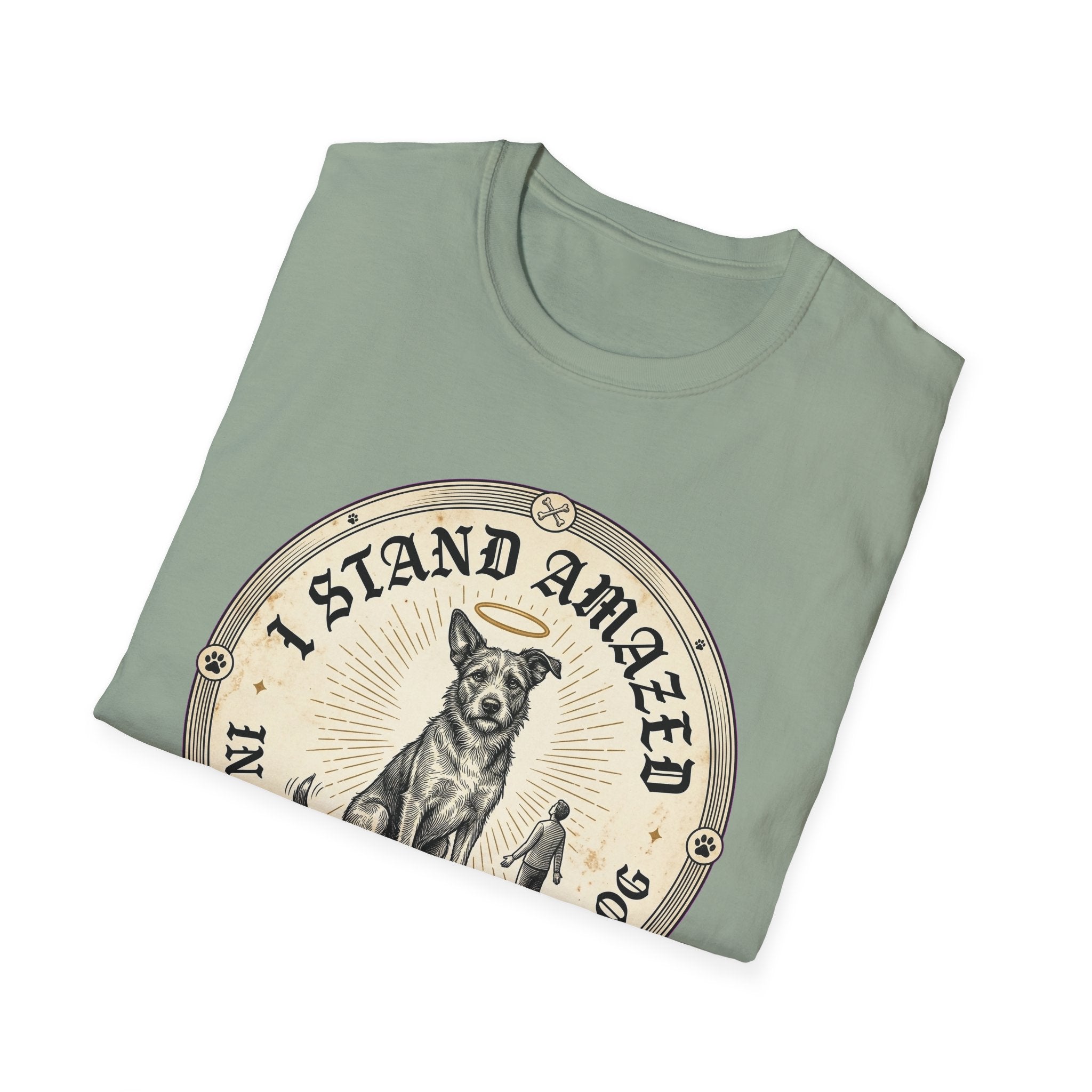 I Stand Amazed Rescue Mutt T-Shirt in sage green, folded view showing the front graphic of the rescue mutt design with halo and 'I Stand Amazed' text.