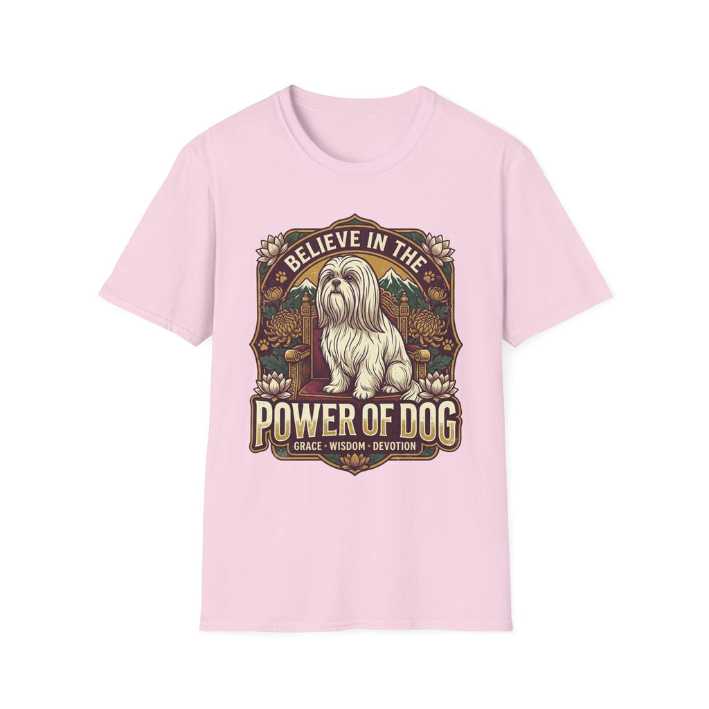 Believe in the Power of Dog Shih Tzu Throne T-Shirt in light pink, flat lay, featuring a vintage badge graphic of a fluffy white Shih Tzu seated regally on a throne surrounded by lotus flowers and mountains, with text reading Believe in the Power of Dog and Grace, Wisdom, Devotion.