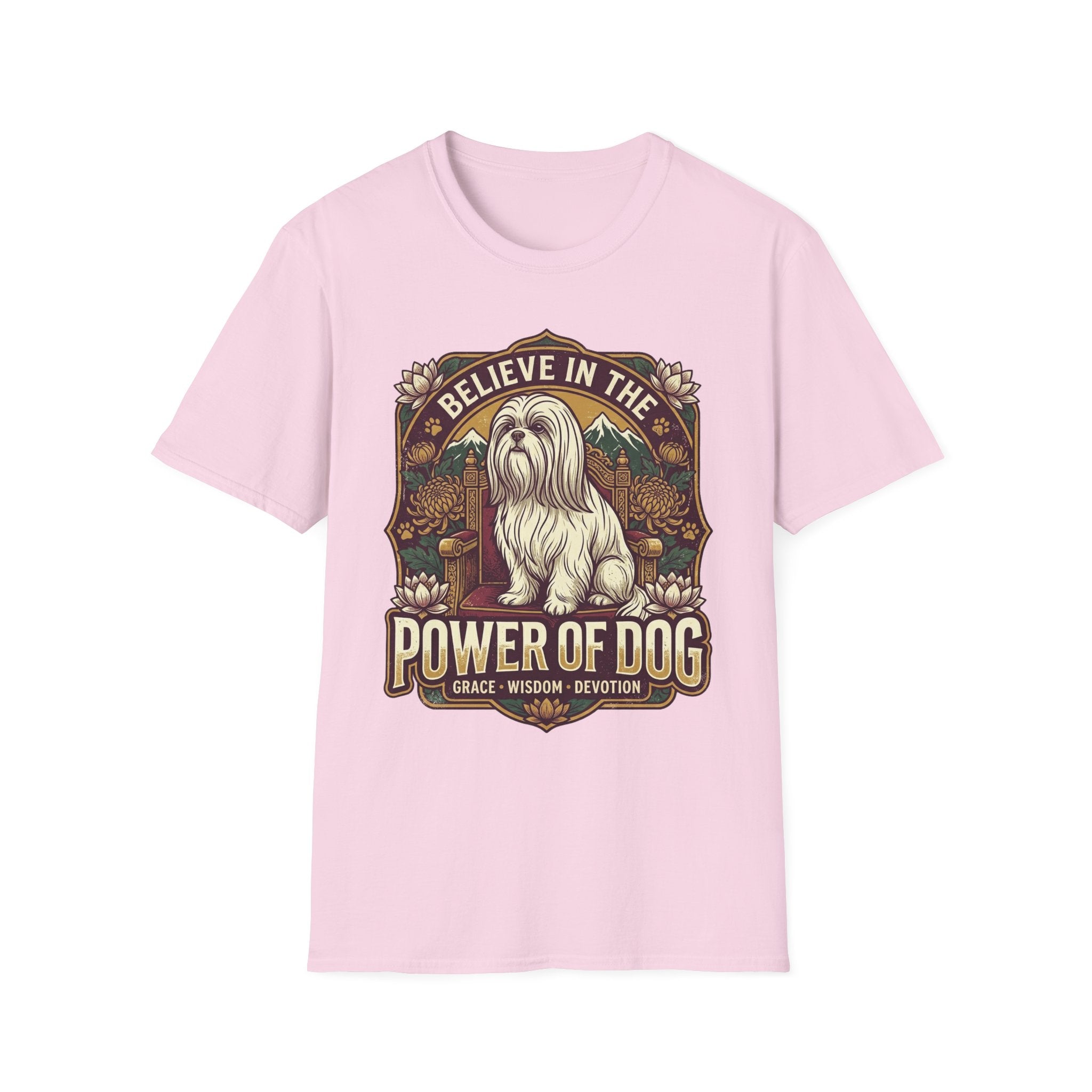 Believe in the Power of Dog Shih Tzu Throne T-Shirt in light pink, flat lay, featuring a vintage badge graphic of a fluffy white Shih Tzu seated regally on a throne surrounded by lotus flowers and mountains, with text reading Believe in the Power of Dog and Grace, Wisdom, Devotion.