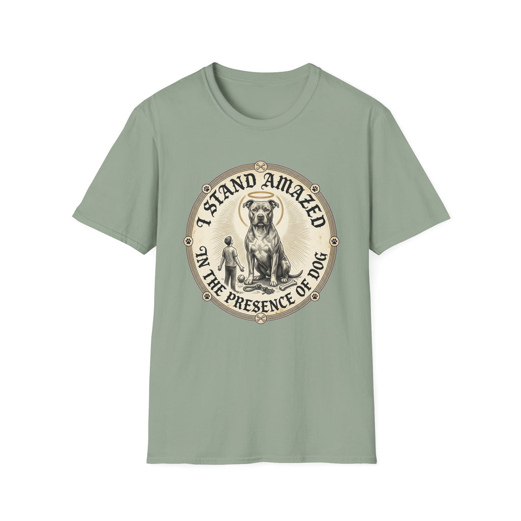 I Stand Amazed Pitbull T-Shirt in sage green, flat lay front view showing a vintage-style circular graphic of a pitbull with a halo seated above a small human figure, with the text 'I Stand Amazed in the Presence of Dog.'