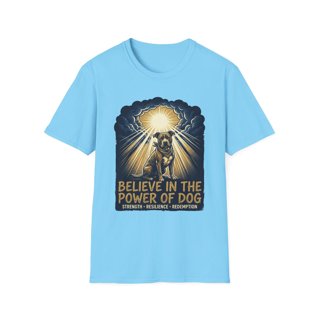 Believe in the Power Pitbull Clouds T-Shirt in light blue, flat lay, featuring a dramatic illustrated graphic of a brindle Pitbull standing before a burst of heavenly light breaking through storm clouds, with text reading Believe in the Power of Dog and Strength, Resilience, Redemption.