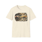 Creation of Adam T-Shirt flat lay in natural cream, featuring a dog-themed parody of the Michelangelo fresco with a human hand reaching toward a dog's paw, an angel golden retriever and cherub amid baroque golden clouds.