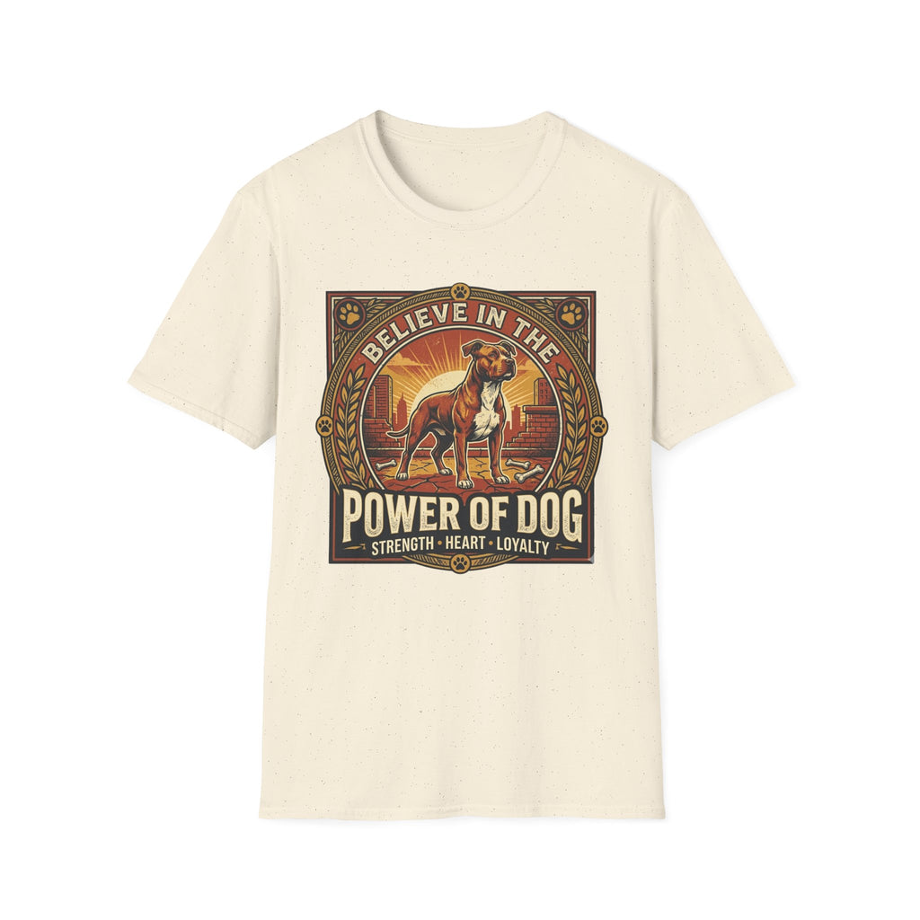 Believe in the Power of Dog Pitbull Cityscape T-Shirt in natural cream, flat lay, featuring a retro-style badge graphic of a muscular brown and white Pitbull standing proudly before a warm urban cityscape at sunset, with text reading Believe in the Power of Dog and Strength, Heart, Loyalty.