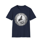 Saint Meatball Defend Us T-Shirt flat lay on navy blue shirt featuring a vintage medallion design with a Doberman Pinscher saint and the text Saint Meatball Defend Us.