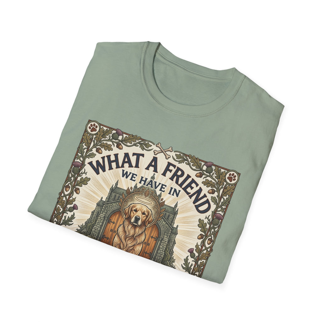 What a Friend We Have in Dog T-Shirt folded view, sage green shirt showing the graphic of a golden retriever with halo framed by oak leaves and thistles with the text 'What a Friend We Have in Dog.'