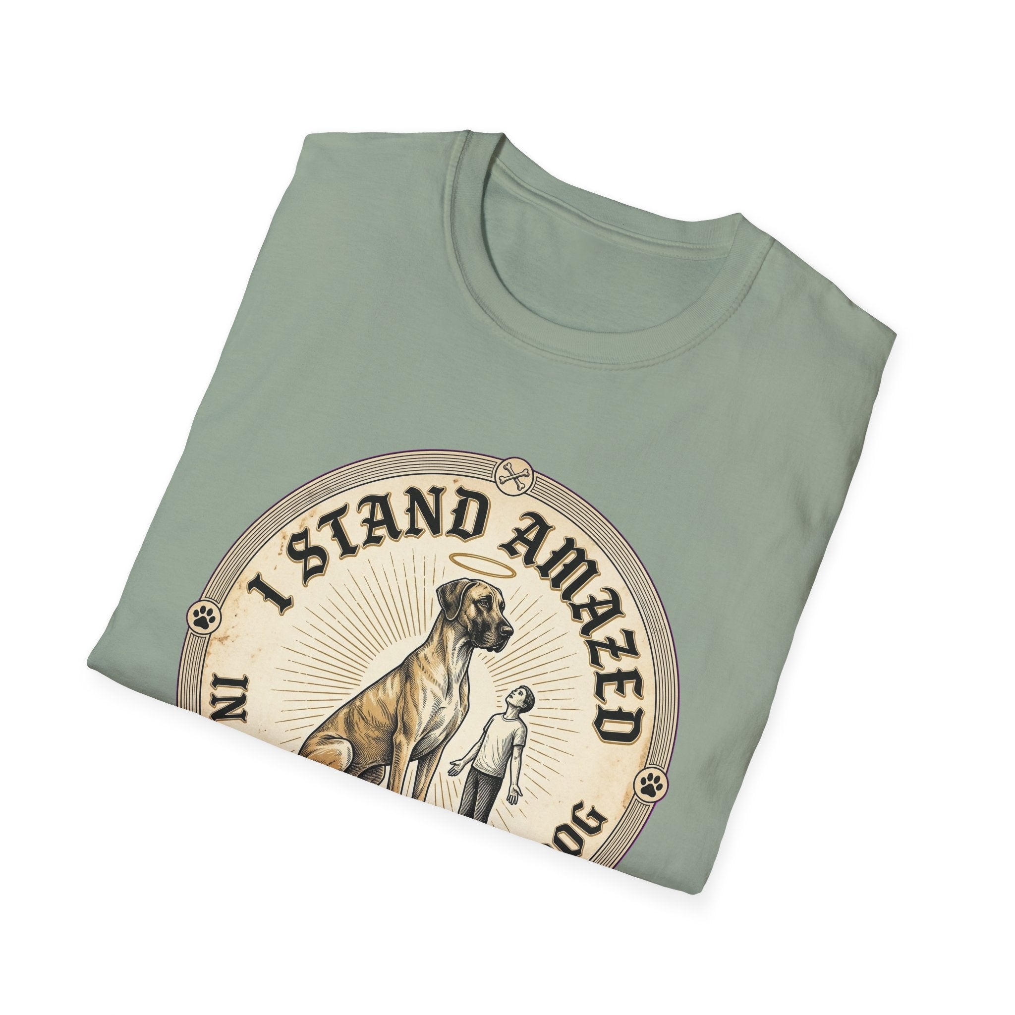 I Stand Amazed Great Dane T-Shirt folded view in sage green, showing the massive Great Dane with halo graphic and "I Stand Amazed" text on the front.