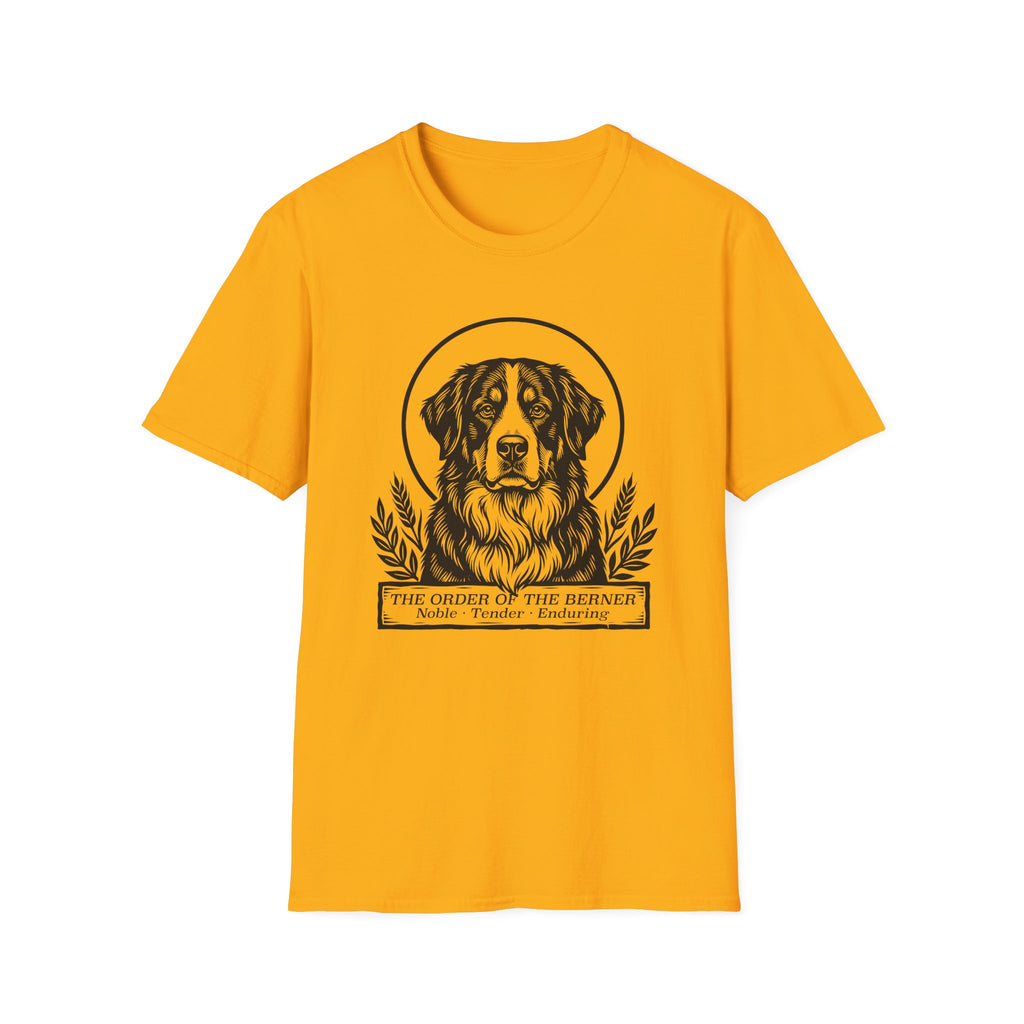 Holy Orders | Bernese Mountain Dog T-Shirt flat lay on sage green shirt featuring a stained glass style illustration of a Bernese Mountain Dog depicted as a holy figure with a golden halo and the text 'Holy Orders.'