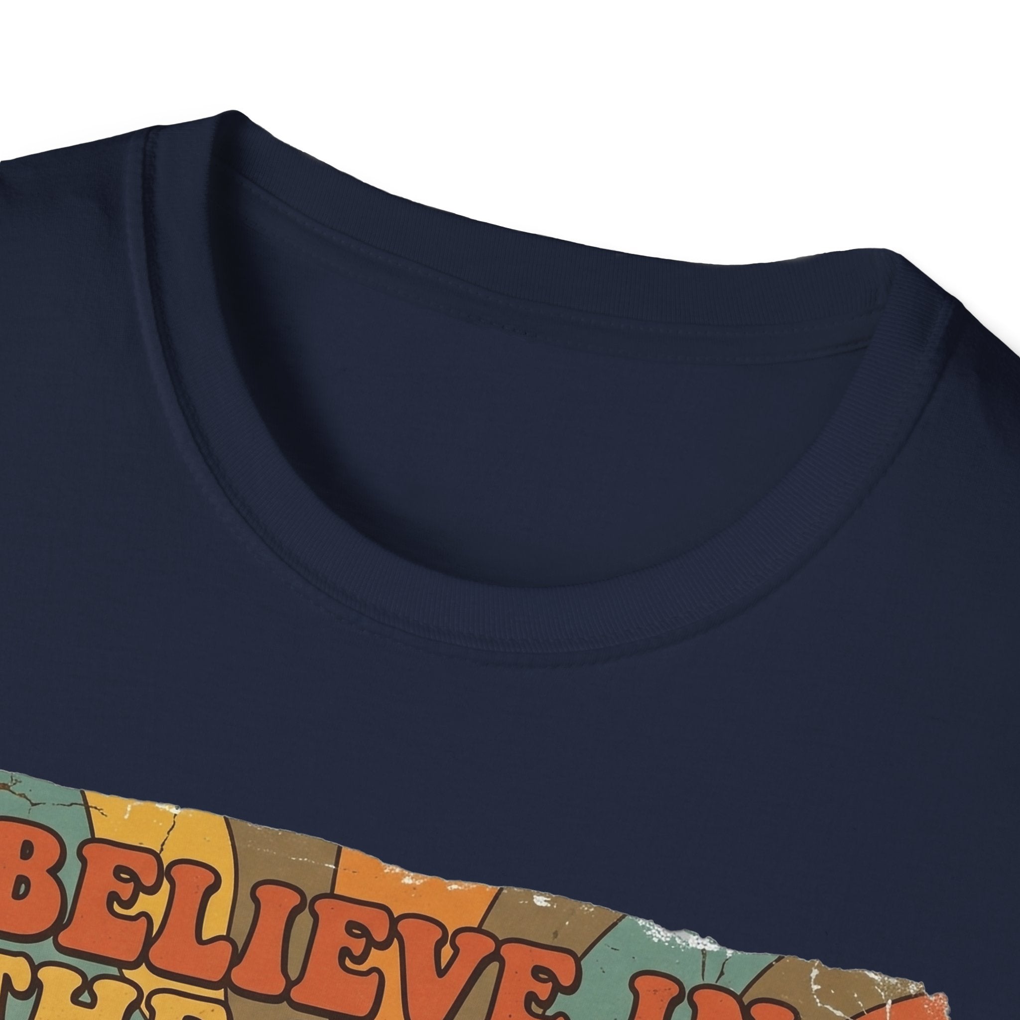 Believe in the Power of Dog Retro T-Shirt close-up detail in navy, showing the collar and top edge of the retro rainbow and groovy text graphic.