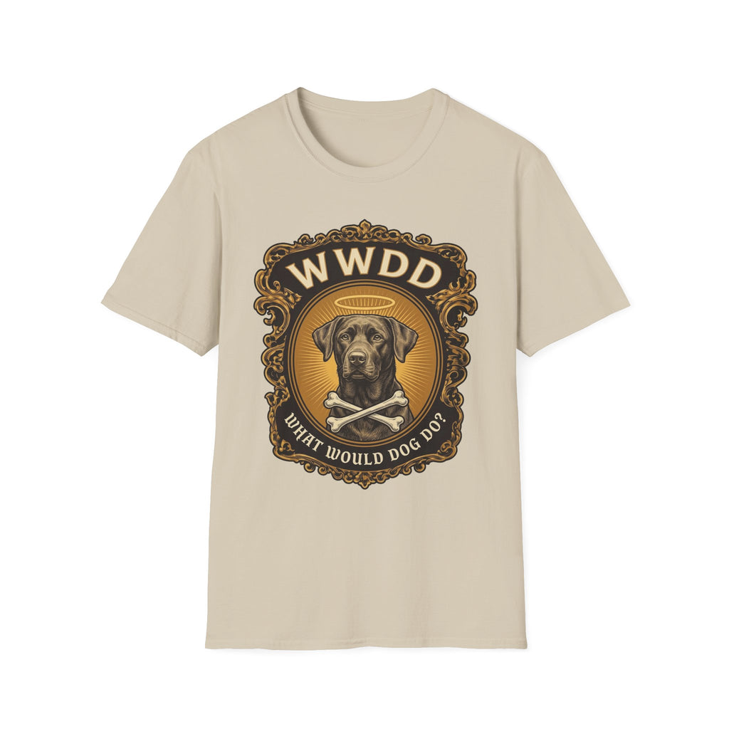 What Would Dog Do Chocolate Lab T-Shirt flat lay on sand, featuring an ornate gold WWDD badge with a halo-wearing chocolate Labrador and crossbones and the text 'What Would Dog Do?'