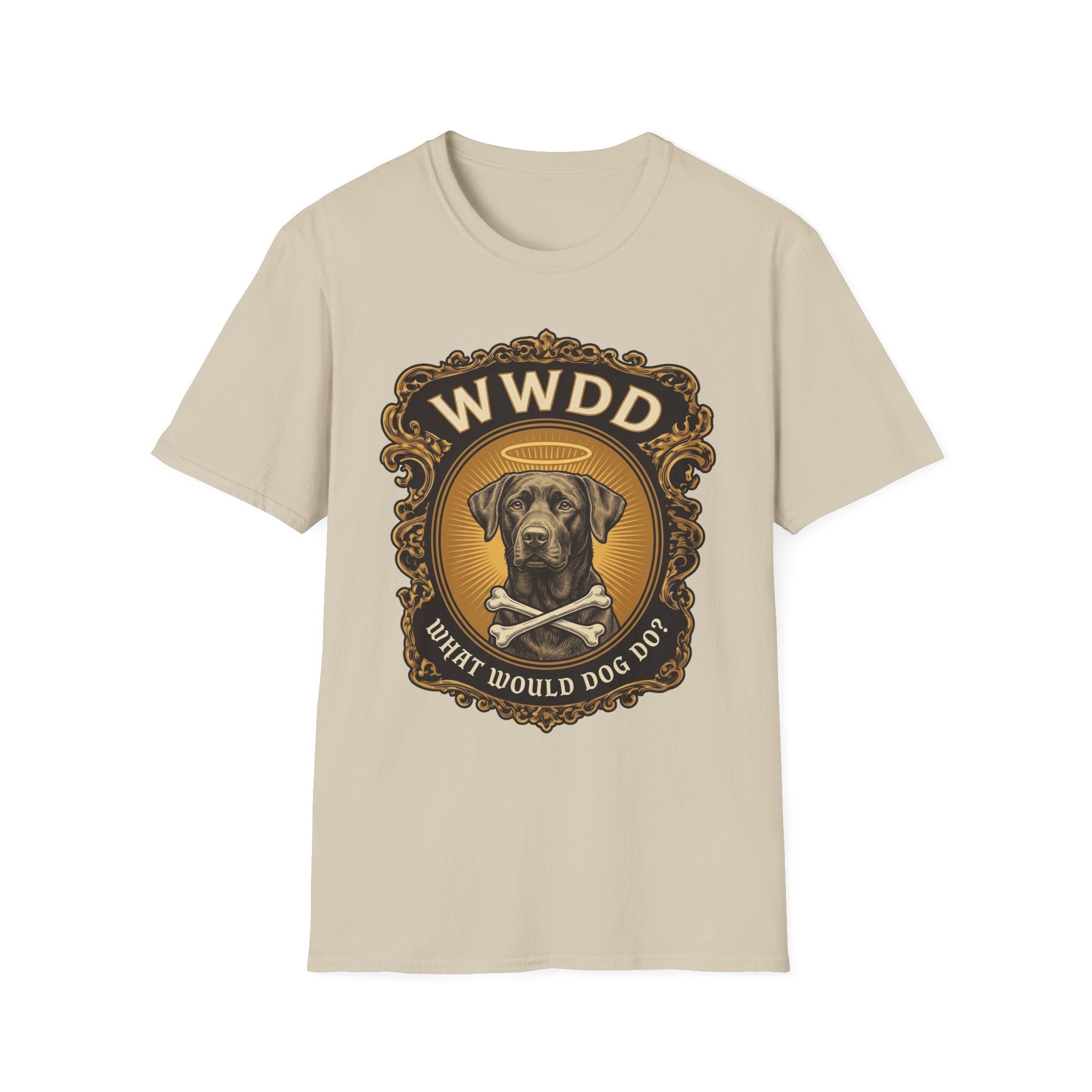 What Would Dog Do Chocolate Lab T-Shirt flat lay on sand, featuring an ornate gold WWDD badge with a halo-wearing chocolate Labrador and crossbones and the text 'What Would Dog Do?'