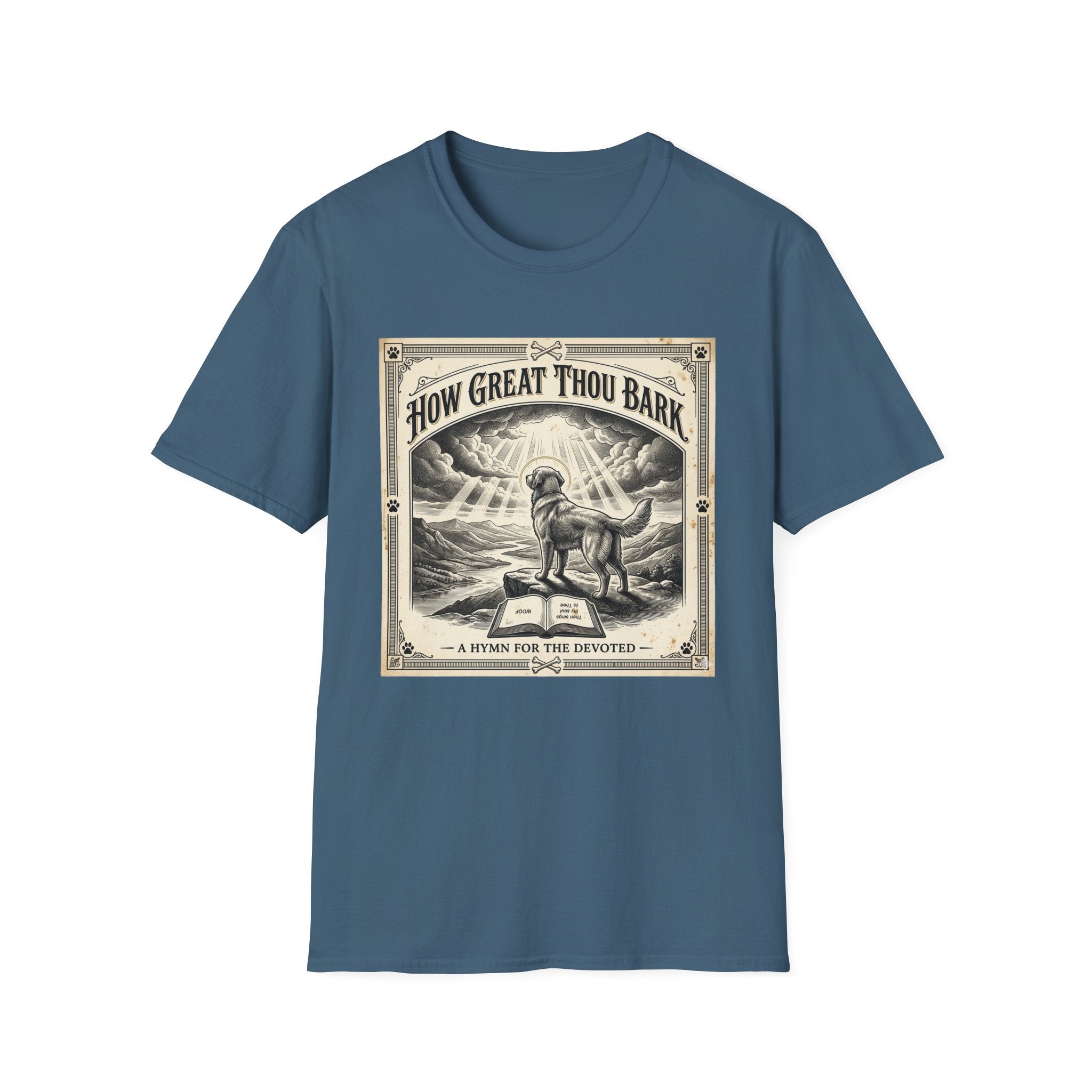 How Great Thou Bark Monotone T-Shirt flat lay on steel blue/indigo shirt featuring a vintage-style sepia graphic of a dog standing on a hilltop with divine rays of light and an open bible, with the text 'How Great Thou Bark – A Hymn for the Devoted.'