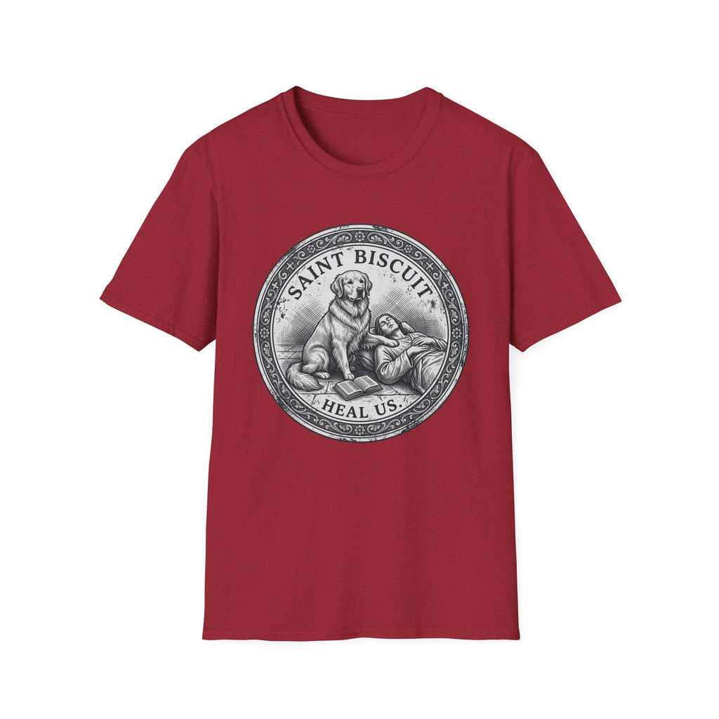 Saint Biscuit Heal Us T-shirt flat lay in cardinal red, featuring a vintage-style medallion graphic of a golden retriever dog watching over a reclining figure with the text 'Saint Biscuit Heal Us'.